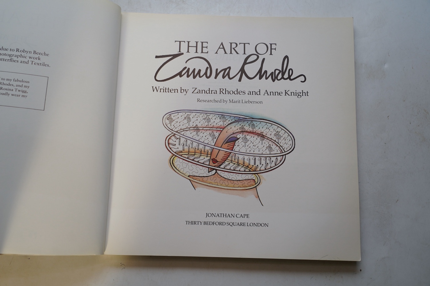 A Zandra Rhodes handbag and The Art of Zandra Rhodes signed book